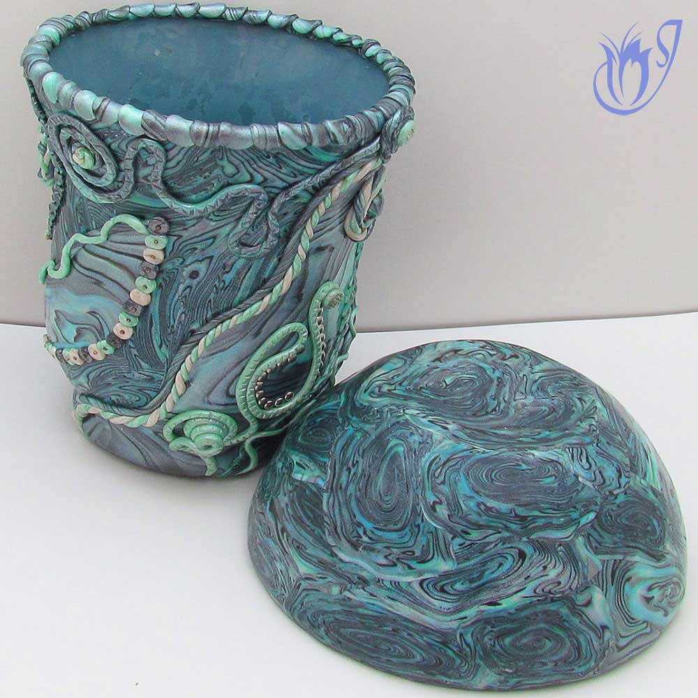 Polymer clay covered jar and bowl