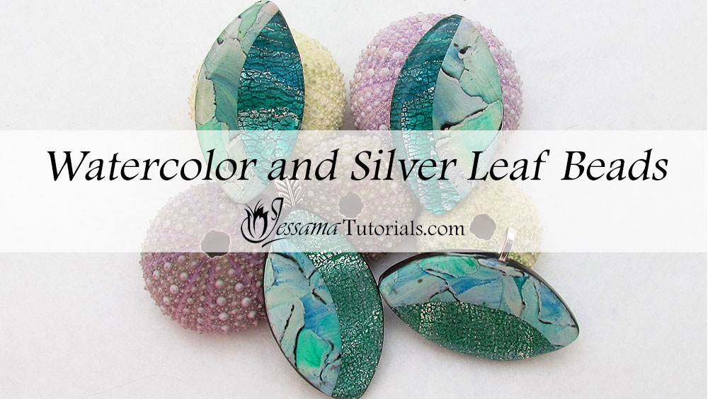 watercolor and silver leaf polymer clay pendant